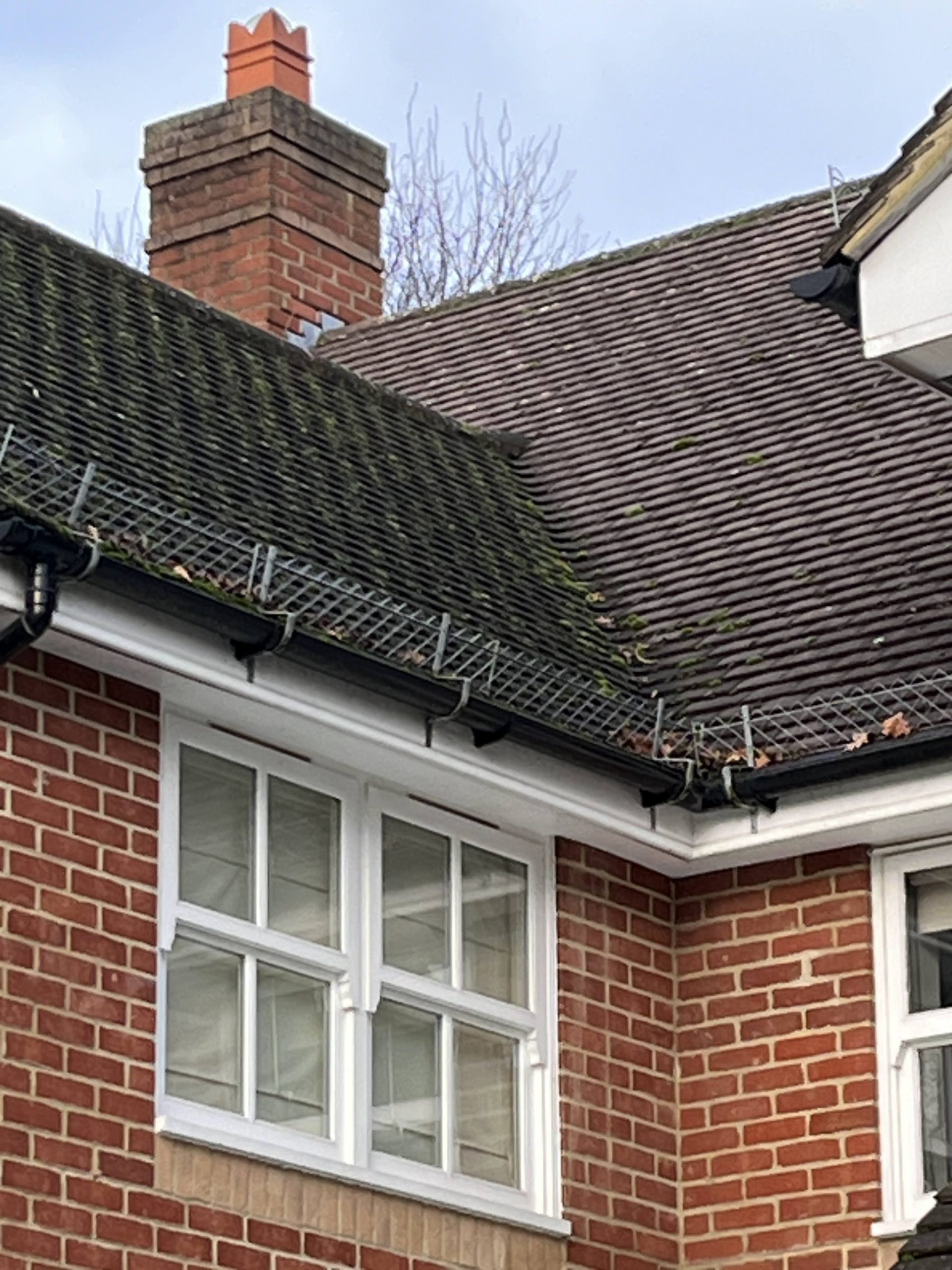 What are the benefits of regular roof cleaning?