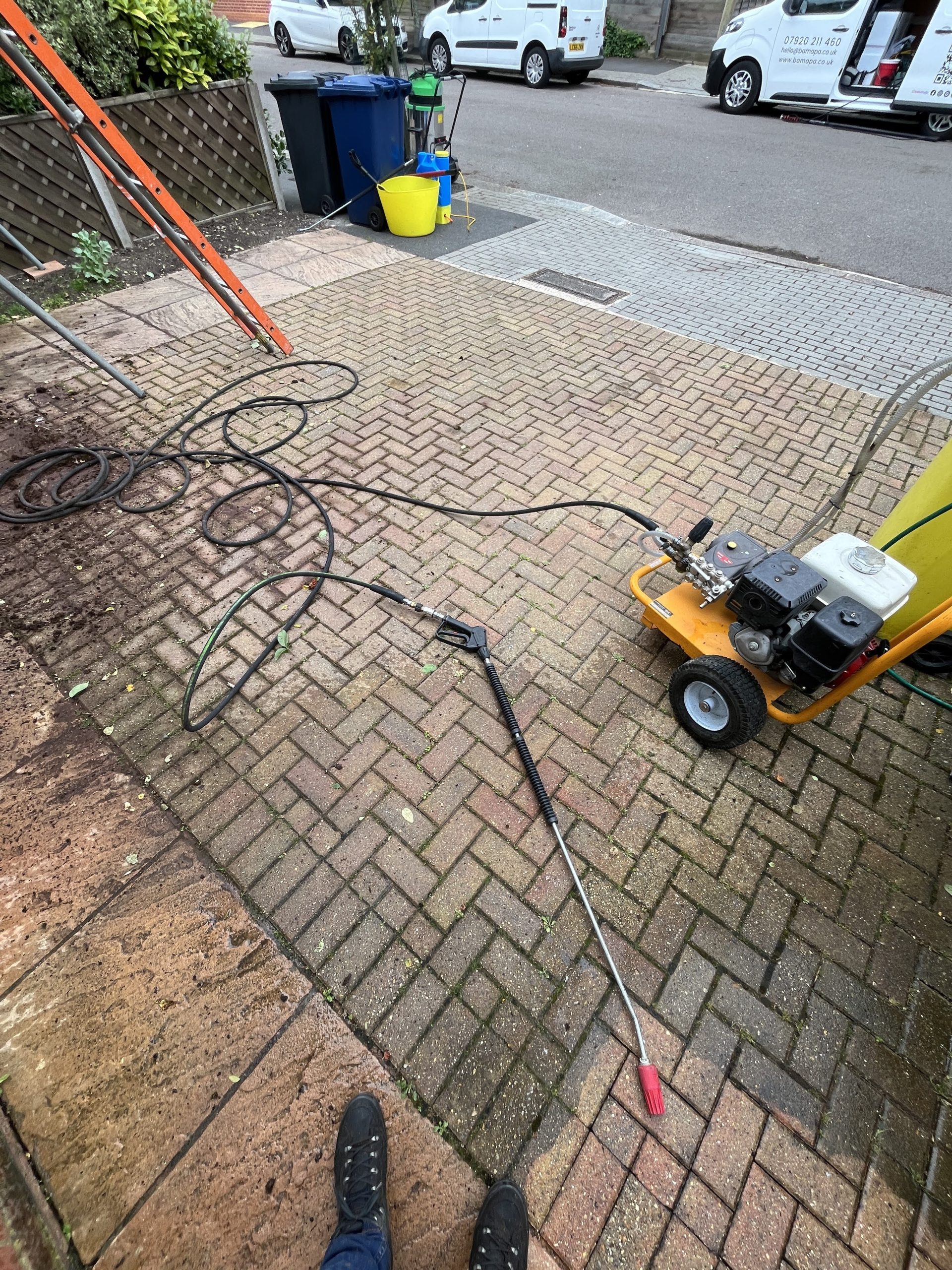 How can pressure washing prevent structural damage?