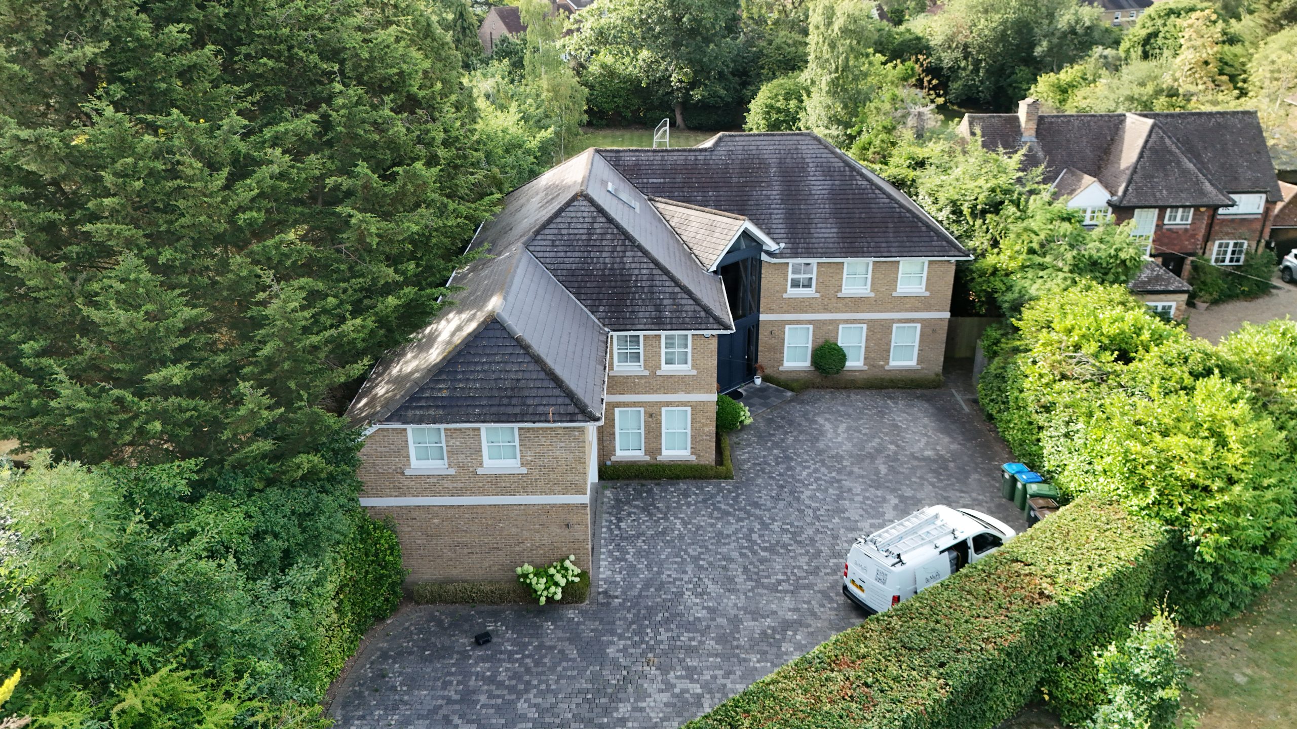 Is pressure washing safe for all roof types?