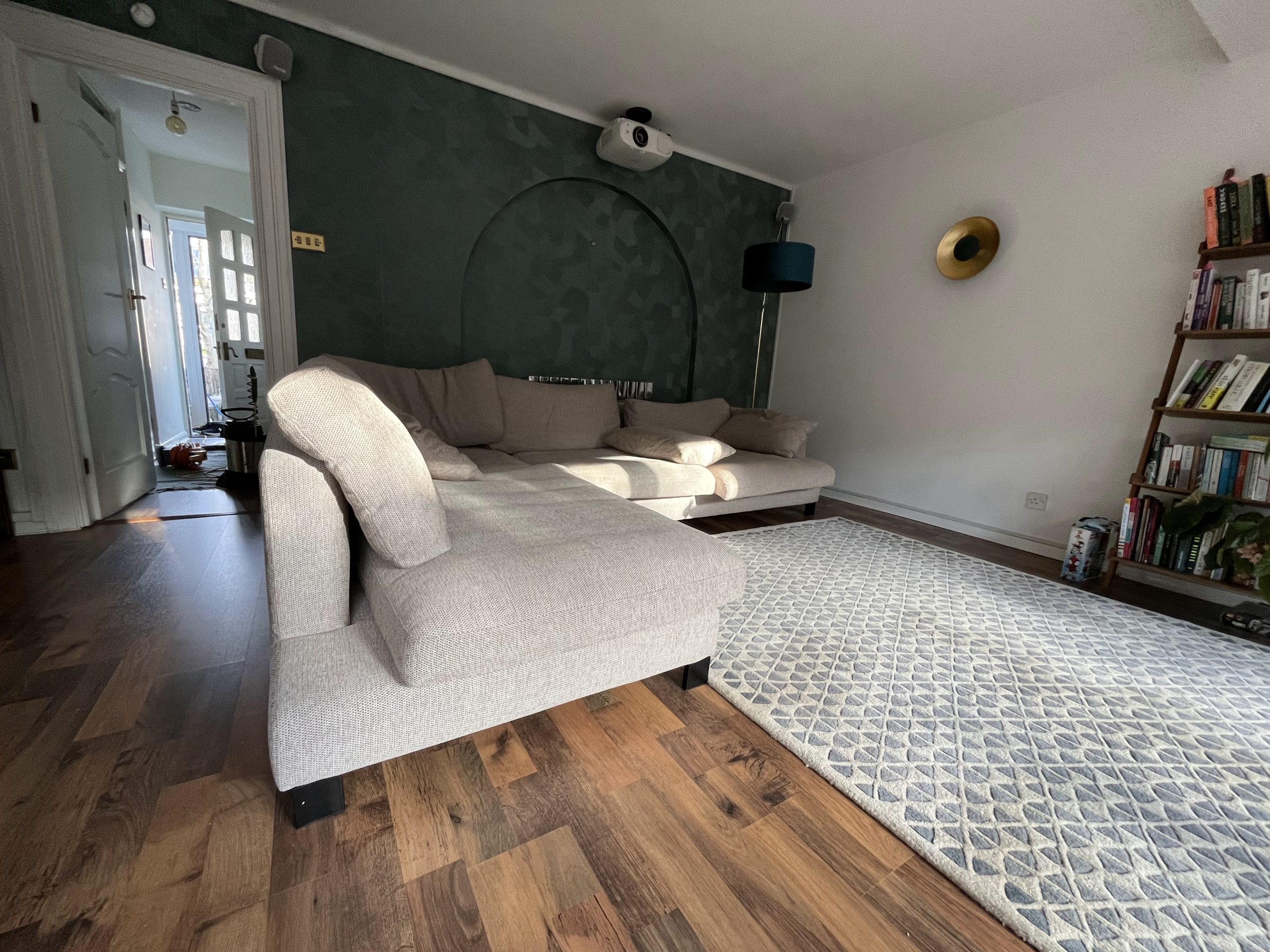 Why is regular wood floor cleaning essential for longevity?