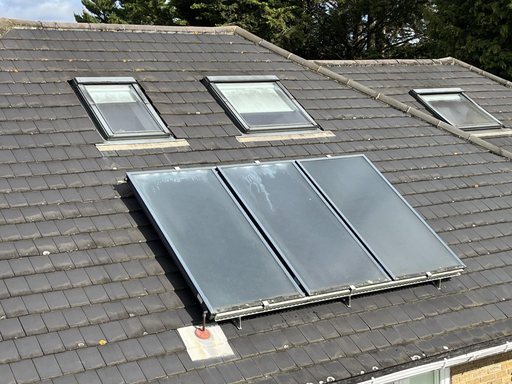 How does professional cleaning improve solar panel lifespan?
